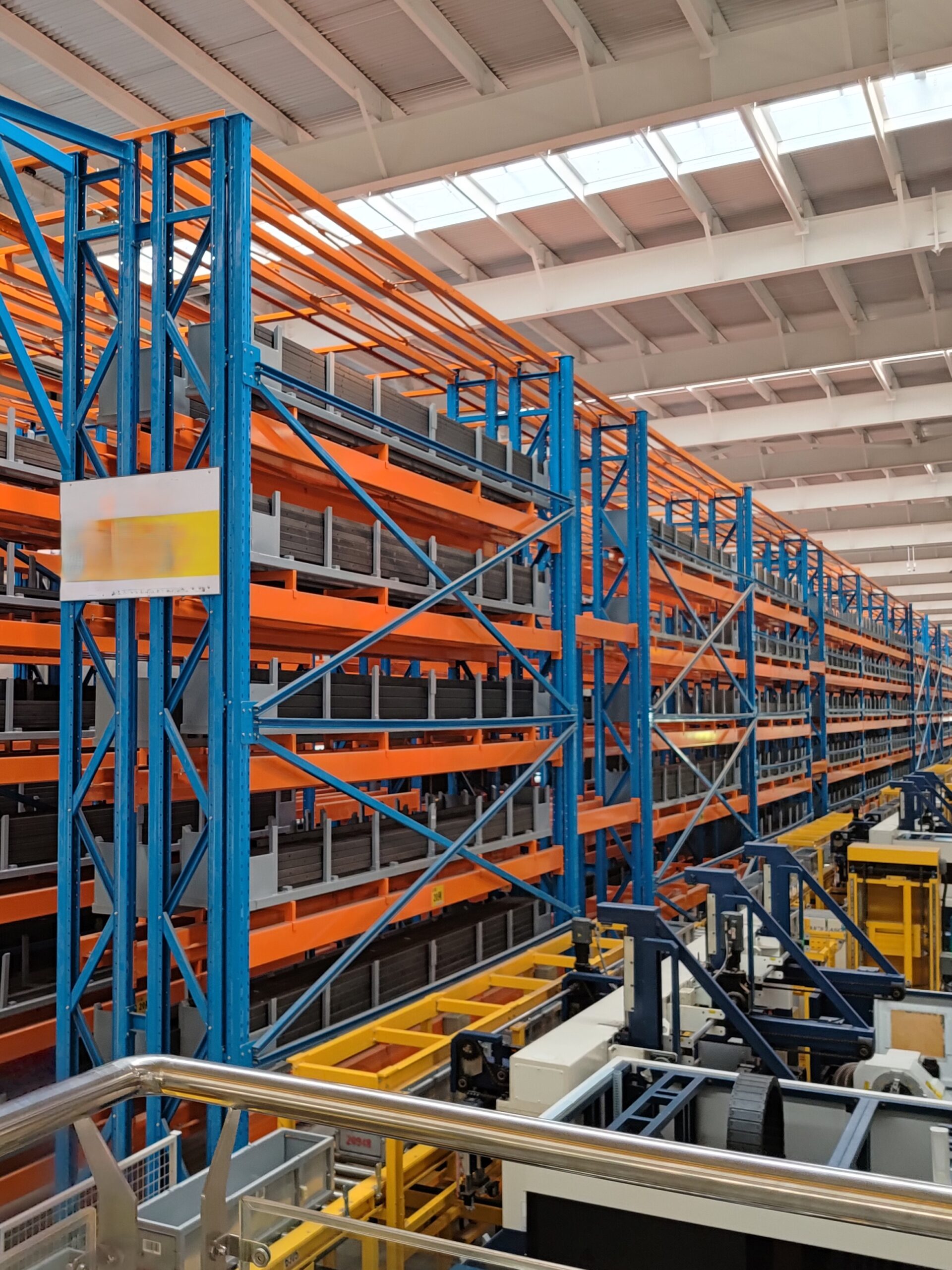 Automated Storage and Retrieval System (ASRS) in a high-bay warehouse