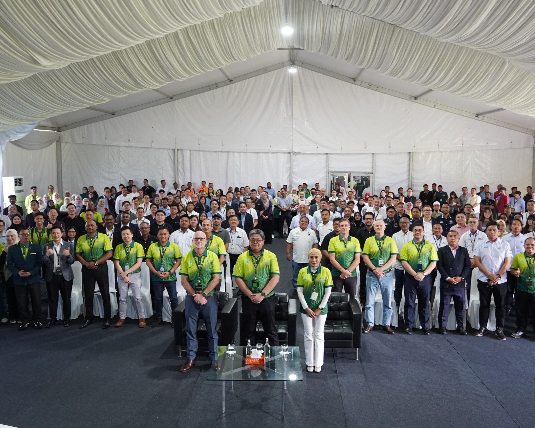 Mach 1 Group team at their booth during PTP Vendor Day 2025, engaging with visitors and showcasing container terminal solutions, group photo