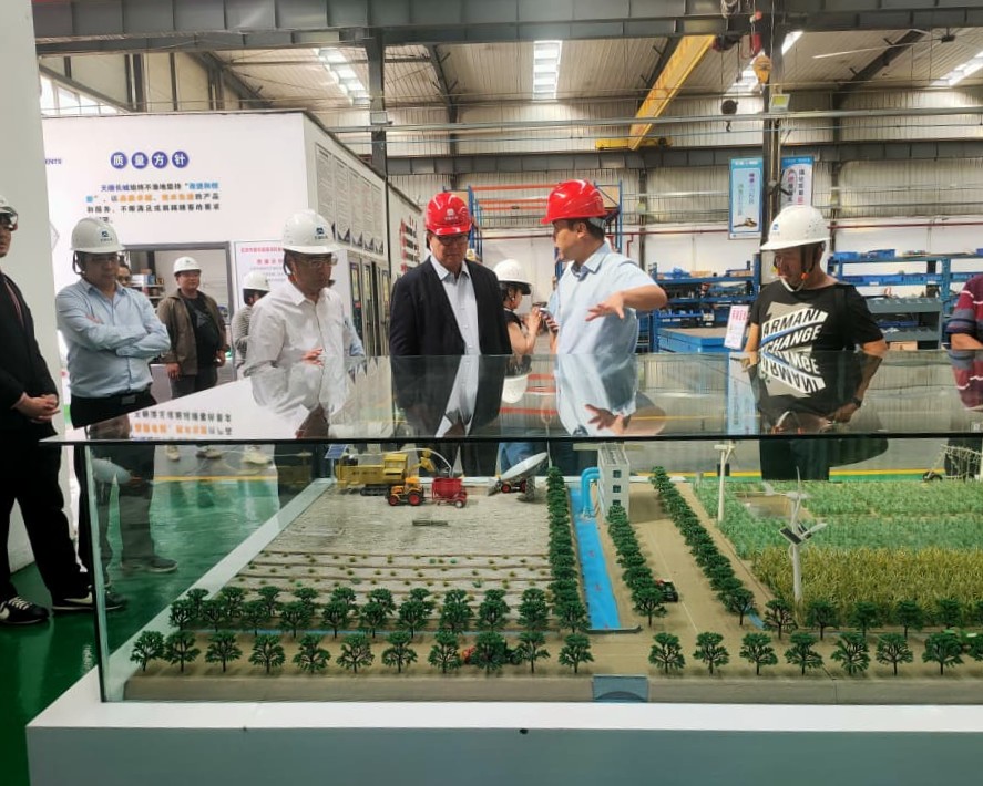 Explaining to the customer in the factory site